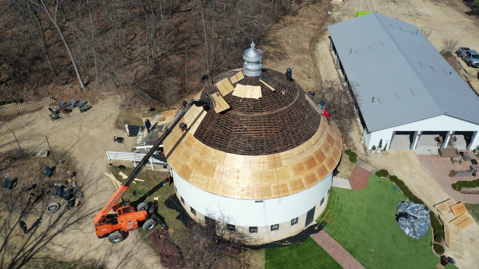 Drone view of the round barn roof mid-restoration in Wacouta MN